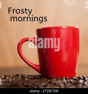 Composé de texte matinal givré sur une tasse à café rouge Banque D'Images