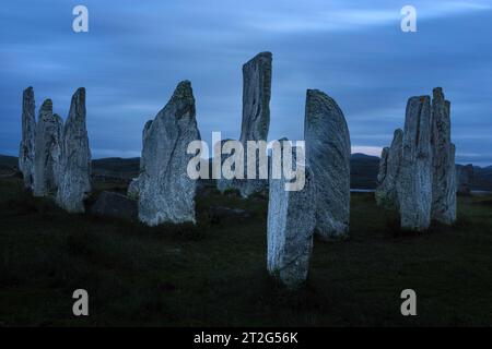 Les Callanish Stones sont un cercle de pierres mégalithiques mystérieux et impressionnant sur l'île de Lewis dans les Hébrides extérieures d'Écosse. Banque D'Images