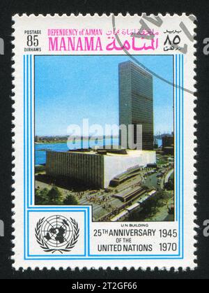 MANAMA - CIRCA 1970 : timbre imprimé par Manama, montrant le siège des Nations Unies, circa 1970 Banque D'Images