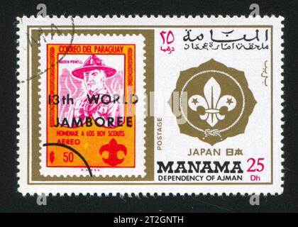 MANAMA - CIRCA 1960 : timbre imprimé par Manama, montrant l'emblème du Jamboree et Baden Powell, circa 1960 Banque D'Images