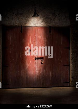 Deux grandes portes anciennes en bois serties dans un mur de pierre dans l'ombre, éclairées d'en haut avec une piscine de lumière Banque D'Images