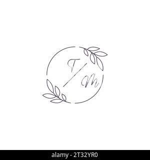 Logo de mariage monogramme d'initiales TM avec contour de feuille simple et graphique vectoriel de style cercle Illustration de Vecteur