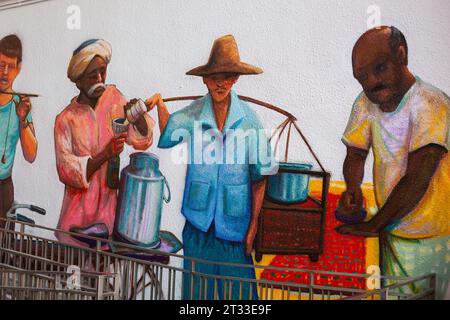 Peinture murale en couleur artistique représentant des gens dans les vieux métiers, Singapour. Banque D'Images