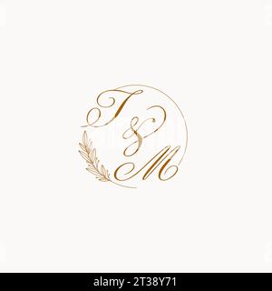 Initiales TM logo de monogramme de mariage avec des feuilles et élégant graphique vectoriel de lignes circulaires Illustration de Vecteur