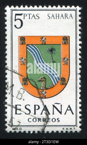 ESPAGNE - CIRCA 1965 : timbre imprimé par l'Espagne, montrant les armes provinciales, Sahara, circa 1965. Banque D'Images