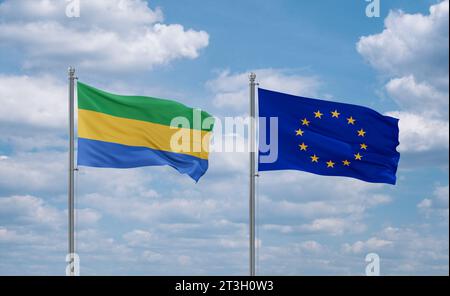 Drapeaux de l'Union européenne et du Gabon agitant ensemble dans le vent sur ciel nuageux bleu, concept de relation Banque D'Images