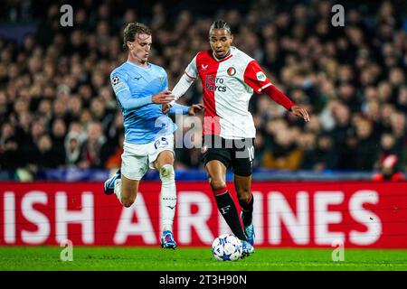 Rotterdam, pays-Bas. 25 octobre 2023. Rotterdam - Nicolo Rovella du Latium, Calvin Stengs du Feyenoord lors de la 3e étape de la phase de groupes de l'UEFA Champions League entre Feyenoord et SS Lazio au Stadion Feijenoord de Kuip le 25 octobre 2023 à Rotterdam, aux pays-Bas. Crédit : photos boîte à boîte/Alamy Live News Banque D'Images
