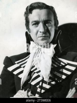 L'acteur canado-américain Raymond Massey dans le film The Scarlet Pimpernel, Royaume-Uni 1934 Banque D'Images