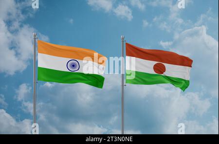 Drapeaux du Niger et de l'Inde agitant ensemble sur un ciel nuageux bleu, concept de relation entre deux pays Banque D'Images