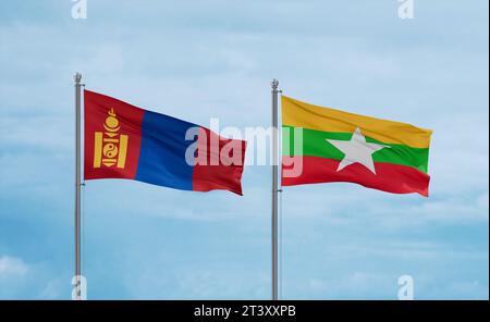 Myanmar aka Birmanie et Mongolie drapeaux agitant ensemble sur un ciel nuageux bleu, concept de relation entre deux pays Banque D'Images