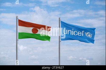 Drapeaux UNICEF et Niger agitant ensemble dans le vent sur ciel nuageux bleu, concept de relation Banque D'Images