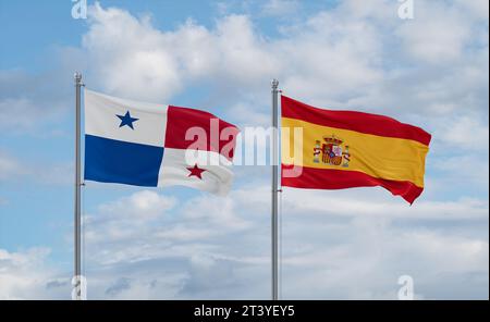 Drapeaux de l'Espagne et du Panama agitant ensemble dans le vent sur le ciel nuageux bleu, concept de relation de deux pays Banque D'Images