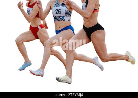 gros plan jambes femmes athlètes coureuses course de sprint, athlétisme d'été isolé sur fond blanc Banque D'Images