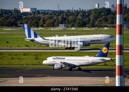 Flughafen Düsseldorf, NRW, Condor Airbus A330-200 Beim Start, Lufthansa Airbus A310-100 auf dem Taxiway, Luftverkehr dus *** aéroport de Düsseldorf, NRW, Condor Airbus A330 200 au décollage, Lufthansa Airbus A310 100 sur la voie de circulation, trafic aérien dus crédit : Imago/Alamy Live News Banque D'Images