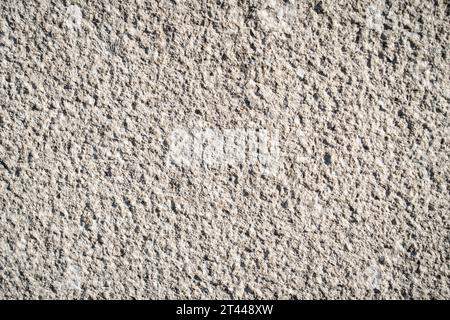 Gros plan d'un mur en béton texturé Banque D'Images
