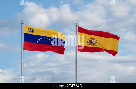 Drapeaux de l'Espagne et du Venezuela agitant ensemble dans le vent sur ciel nuageux bleu, concept de relation de deux pays Banque D'Images