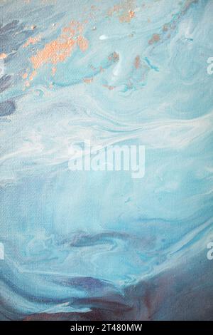 Peinture acrylique fluide abstraite. Fond abstrait bleu marbré. Banque D'Images