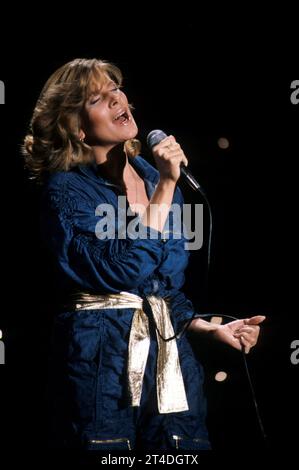 DEBBY BOONE ; chanteuse et actrice américaine ; live in concert, USA ; vers les années 1980 ; crédit : Lynn McAfee / Performing Arts Images ; www.performingartsimages.com Banque D'Images