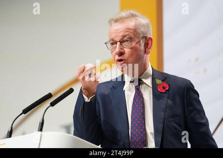 Le secrétaire de Levelling Up Michael Gove s'exprimant lors de la conférence de l'Alliance pour une citoyenneté responsable dans le centre de Londres. Date de la photo : mardi 31 octobre 2023. Banque D'Images