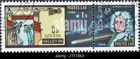 Timbre postal annulé imprimé par le Laos, qui montre la Tapisserie de Bayeux, Halley Comet, vers 1986. Banque D'Images