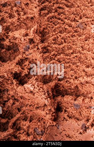 Structure de la crème glacée au chocolat congelé gros plan. Fond de crème glacée. Banque D'Images