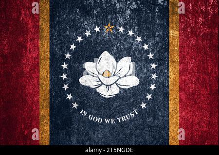 Gros plan du drapeau grunge de l'État du Mississippi. Drapeau sale de l'État du Mississippi sur une surface métallique. Banque D'Images