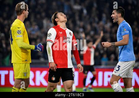 Rome, Italie. 07 novembre 2023. Ayase Ueda de Feyenoord réagit alors que Alessio Romagnoli du SS Lazio célèbre lors du match de football du Groupe E de la Ligue des Champions entre SS Lazio et Feyenoord au stade Olimpico à Rome (Italie), le 7 novembre 2023. Crédit : Insidefoto di andrea staccioli/Alamy Live News Banque D'Images