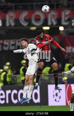 Fabian Ruiz (PSG) Ruben Loftus-Cheek (Milan) lors du match de l'UEFA 'Champions League 2023 2024' entre le PSG Milan 2-1 au stade Giuseppe Meazza le 7 novembre 2023 à Milan, Italie. Crédit : Maurizio Borsari/AFLO/Alamy Live News Banque D'Images