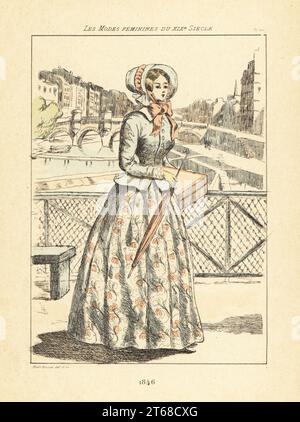 Femme à la mode sur le Pont des Arts, Paris, 1846. La Seine et le Pont neuf en pierre entre la Rive Guache et l'Ile de la Cité en arrière-plan. Elle porte un bonnet, une veste ajustée, des jupes florales, et porte un parasol et une boîte. Gravure en pointe-seche ou à pointe-séche de couleur main par Henri Boutet des modes Feminines du XIXème siècle Siecle (Fashions féminines du 19th siècle), Ernest Flammarion, Paris, 1902. Boutet (1851-1919) est un artiste, graveur, lithographe et designer français. Banque D'Images