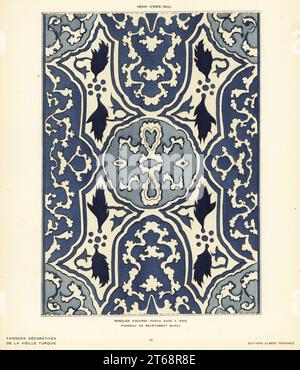 Panneau de carreaux muraux en céramique décorés de foilage dans la mosquée Esrefzade à Iznik, Bursa, fabriqué à Iznik, Turquie, vers 1610.. Mosquee dEchref Pacha Zade a Isnik. Panneau de revêtement mural. Isnik (vers 1610). Pochoir lithographie coloriée à la main d'Alexandre Raymonds Faience Decorative de la Vieille Turquie, Poterie décorative de la Turquie antique, Editions Albert Morance, Paris, 1927. Banque D'Images