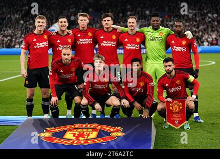 Équipe Manchester United alignée, rangée arrière gauche à droite, Rasmus Hojlund, Diogo Dalot, Scott McTominay, Harry Maguire, Jonny Evans, Andre Onana et Aaron WAN-Bissaka. Au premier rang, Christian Eriksen, Alejandro Garnacho, Marcus Rashford et Bruno Fernandes avant le match de l'UEFA Champions League Group A au Parken Stadium, Copenhague. Date de la photo : mercredi 8 novembre 2023. Banque D'Images