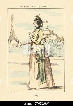 Femme à la mode près de la Tour Eiffel et du Dôme central à la figure aigle, exposition universelle, Paris, 1889. En casquette, veste courte, jupe avec agitation, parasol. Gravure en pointe-seche ou à pointe-séche de couleur main par Henri Boutet des modes Feminines du XIXème siècle Siecle (Fashions féminines du 19th siècle), Ernest Flammarion, Paris, 1902. Boutet (1851-1919) est un artiste, graveur, lithographe et designer français. Banque D'Images