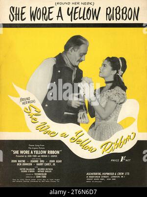 Couverture de British Sheet Music pour JOHN WAYNE et JOANNE DRU dans SHE WEAR A YELLOW RIBBON 1949 réalisateur JOHN FORD Story James Warner Bellah scénario Frank S. Nugent et Laurence Stallings producteurs exécutifs Merian C. Cooper et John Ford Argosy Pictures / RKO radio Pictures Banque D'Images