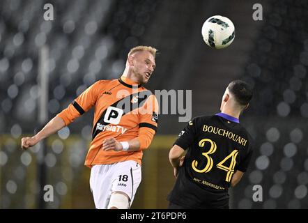 RSCA Futures' Mohamed Bouchouari and Deinze's Bafode Dansoko fight for the  ball during a soccer match between RSC Anderlecht Futures and KMSK Deinze,  Sunday 14 August 2022 in Anderlecht, on day 1