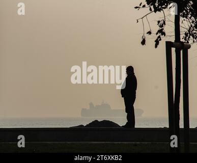 Istanbul coucher de soleil avec silhouettes humaines Banque D'Images