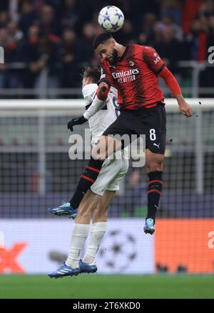 Milan, Italie, 7 novembre 2023. Ruben Loftus-Cheek de l'AC Milan remporte un duel aérien avec Fabian Ruiz du PSG lors du match de l'UEFA Champions League à Giuseppe Meazza, Milan. Le crédit photo devrait se lire : Jonathan Moscrop / Sportimage Banque D'Images