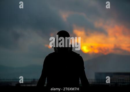 Istanbul coucher de soleil avec silhouettes humaines Banque D'Images