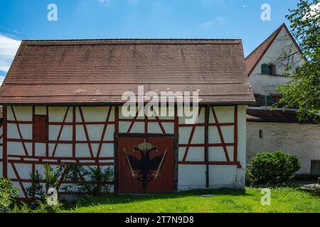 Peint Double aigle impérial sur un bâtiment du musée municipal dans la muraille de la ville, Wangen im Allgäu, haute-Souabe, Allemagne. Banque D'Images