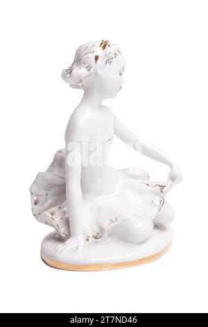 figurine en porcelaine d'une petite ballerine isolée sur blanc. Banque D'Images