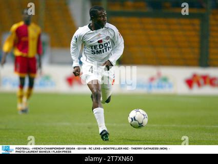 FOOTBALL - CHAMPIONNAT DE FRANCE 2003/04 - 031109 - RC LENS V MONTPELLIER HSC - THIERRY GATHUESSI (MON) - PHOTO LAURENT BAHEUX / FLASH PRESS Banque D'Images