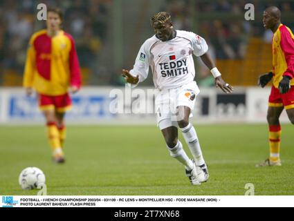 FOOTBALL - CHAMPIONNAT DE FRANCE 2003/04 - 031109 - RC LENS V MONTPELLIER HSC - FODE MANSARE (MON) - PHOTO LAURENT BAHEUX / FLASH PRESS Banque D'Images