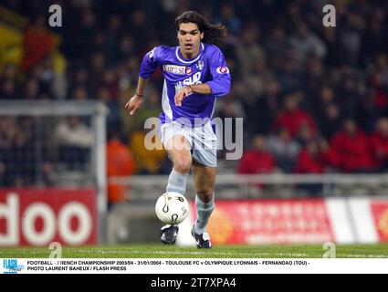 FOOTBALL - CHAMPIONNAT DE FRANCE 2003/04 - 31/01/2004 - TOULOUSE FC - OLYMPIQUE LYONNAIS - FERNANDAO (TOU) - PHOTO LAURENT BAHEUX / PRESSE FLASH Banque D'Images