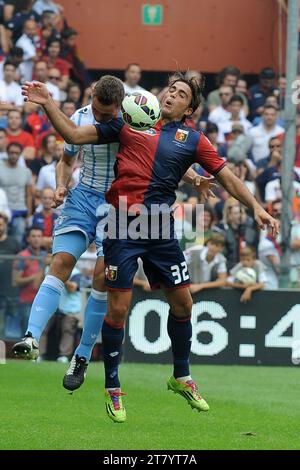 Stefan de Vrij de SS Lazio et Alessandro Matri de Gênes CFC sautent pour le ballon lors du championnat italien Serie A match de football entre Gênes CFC et SS Lazio au stade Luigi Ferraris le 21 septembre 2014 à Gênes, Italie. Photo Massimo Cebrelli / DPPI Banque D'Images