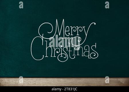 joyeux Noël, écriture vintage sur tableau vert. Banque D'Images