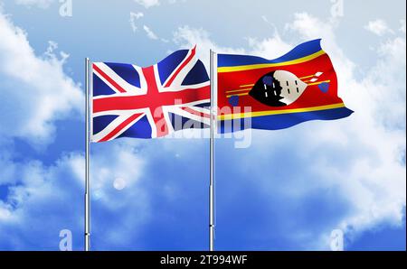 ESwatini et drapeaux britanniques ensemble agitant contre le ciel bleu Banque D'Images