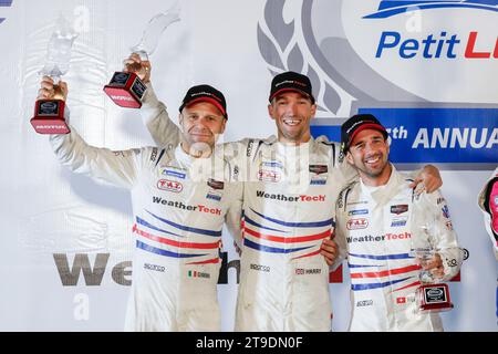 Braselton, Vereinigte Staaten. 15 octobre 2023. Proton Competition (#59), Gianmaria Bruni (I), Harry Tincknell (UK), Neel Jani (CH) (lr) crédit : dpa/Alamy Live News Banque D'Images