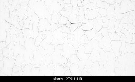 mur blanc avec de la peinture fissurée comme fond abstrait texturé pour une page, un modèle ou une bannière web Banque D'Images