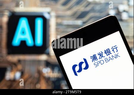 3 novembre 2023, Chine : dans cette illustration photo, le logo SPD de la Shanghai Pudong Development Bank est affiché sur un smartphone avec une puce d'intelligence artificielle (IA) et un symbole en arrière-plan. (Image de crédit : © Budrul Chukrut/SOPA Images via ZUMA Press Wire) USAGE ÉDITORIAL UNIQUEMENT! Non destiné à UN USAGE commercial ! Banque D'Images