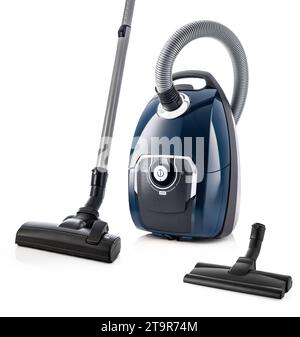 Aspirateur pour les services de nettoyage de la maison isolé sur le fond blanc, balayeuse propre pour le sol et la moquette. Banque D'Images