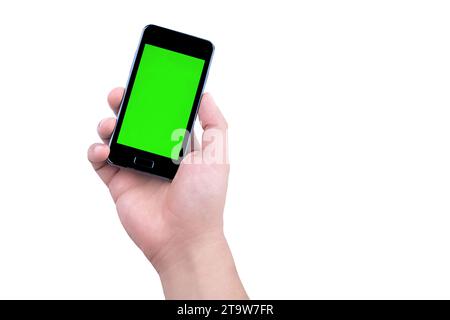 main de l'homme tenant le téléphone intelligent mobile avec écran vert chroma key sur fond blanc, nouveau concept de technologie Banque D'Images